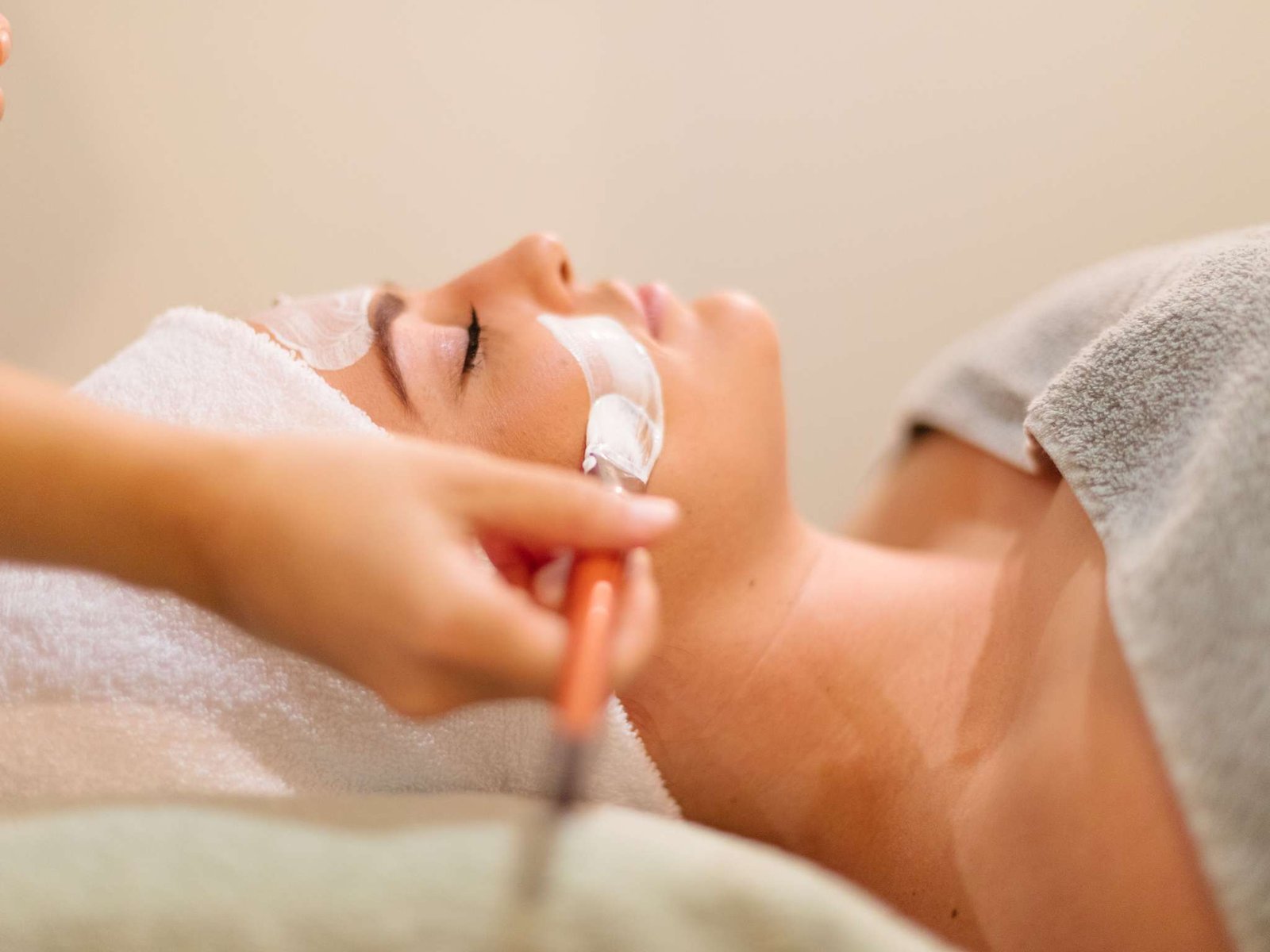 Resort swimming pool area surrounded by palm trees